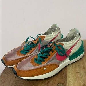 Nike Orange and Pink Sneakers with Teal Laces